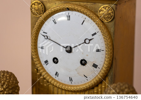 Close-up of an antique bronze mantel clock 136754640