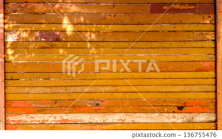 Wooden fence made of boards. Wooden fence made of boards. 136755476