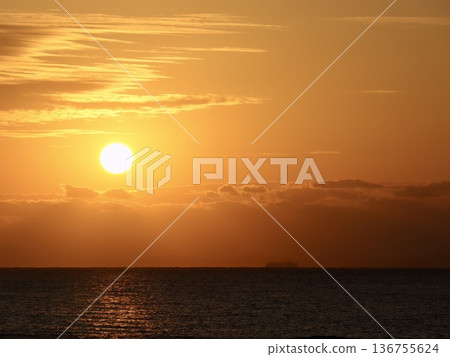 Spectacular view of the ocean and sunset in Chatan, Okinawa, left-justified composition | Tourism, web, and advertising background material 136755624