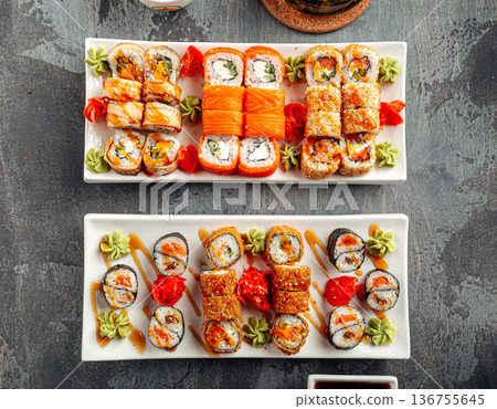 Assorted sushi rolls set with soy sauce 136755645