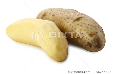 Whole raw potatoes and peeled raw potatoes isolated on a white background Whole raw potatoes and peeled raw potatoes isolated on a white background 136755828