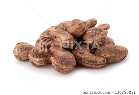 Roasted cashew nuts isolated on a white background. 136755851