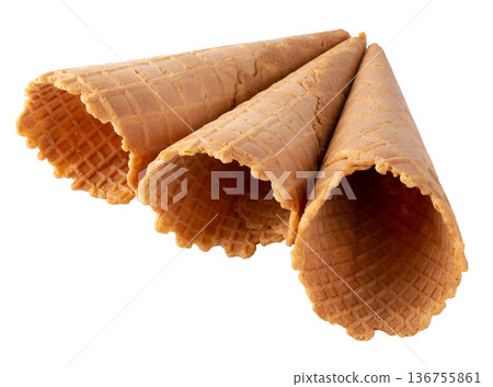 waffle ice-cream cone isolated over white background. waffle ice-cream cone isolated over white background. 136755861