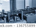 Precision Sheet Metal Stamping in Blue Tone Industrial Scene 136755899