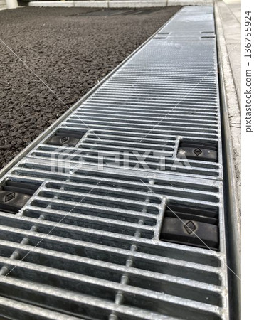 "Grating" installed in road gutters (drainage ditches) "Grating" installed in road gutters (drainage ditches) 136755924
