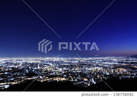 Light trails of aircraft taking off and landing at Osaka International Airport 136756092
