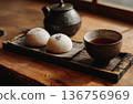 Minimalist Japanese tea and traditional sweet on dark background 136756969