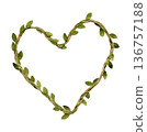 Floral frame for congratulatory text made of jute with green leaves. Heart shape 136757188