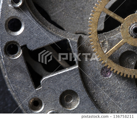 old clockwork, metal gears close up old clockwork, metal gears close up 136758211