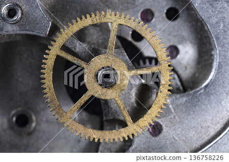 old clockwork, metal gears close up old clockwork, metal gears close up 136758226