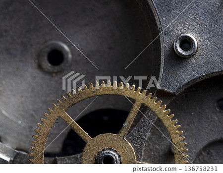 old clockwork, metal gears close up old clockwork, metal gears close up 136758231