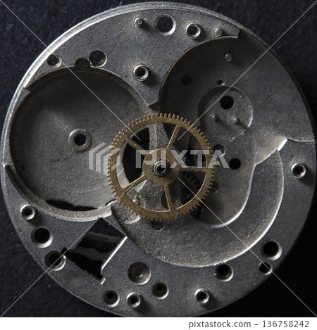 old clockwork, metal gears close up old clockwork, metal gears close up 136758242