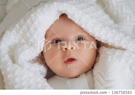 Cute little baby is lying down Cute little baby is lying down 136758583