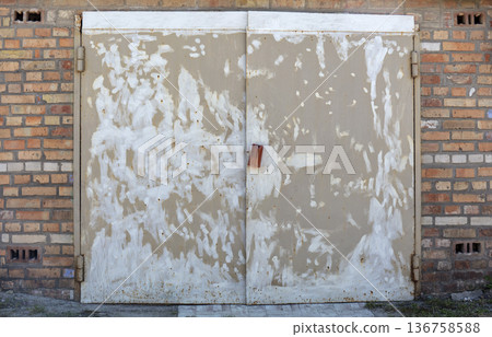 old metal warehouse door, hangar old metal warehouse door, hangar 136758588