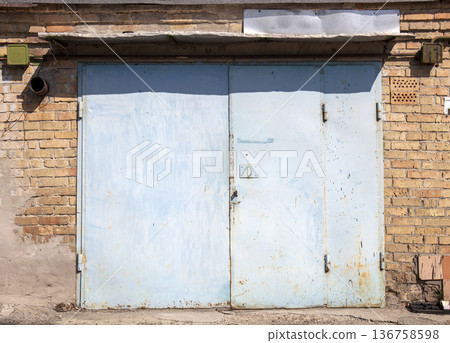 old metal warehouse door, hangar old metal warehouse door, hangar 136758598