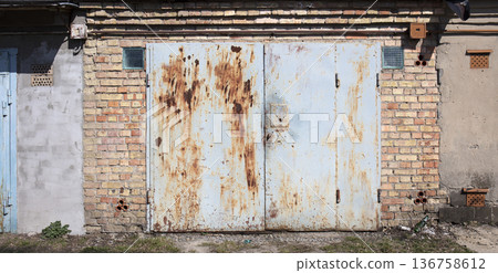 old metal warehouse door, hangar 136758612