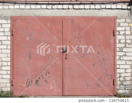 old metal warehouse door, hangar 136758615