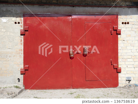 old metal warehouse door, hangar old metal warehouse door, hangar 136758619