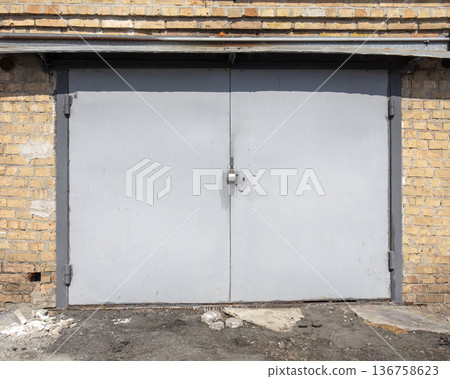 old metal warehouse door, hangar old metal warehouse door, hangar 136758623
