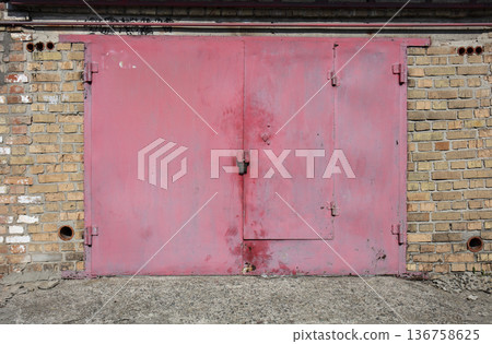 old metal warehouse door, hangar 136758625