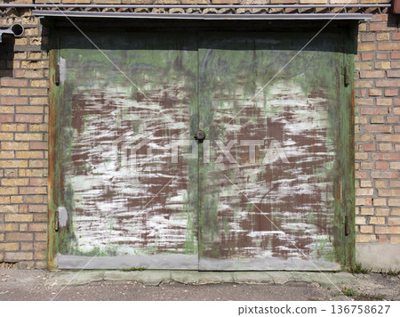 old metal warehouse door, hangar 136758627