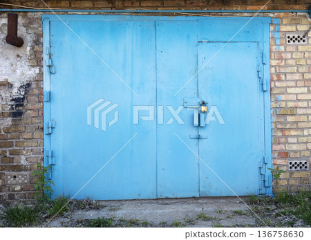 old metal warehouse door, hangar old metal warehouse door, hangar 136758630