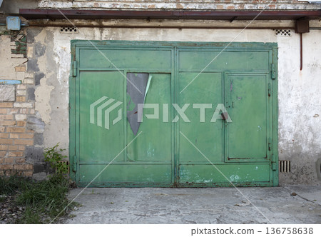 old metal warehouse door, hangar old metal warehouse door, hangar 136758638