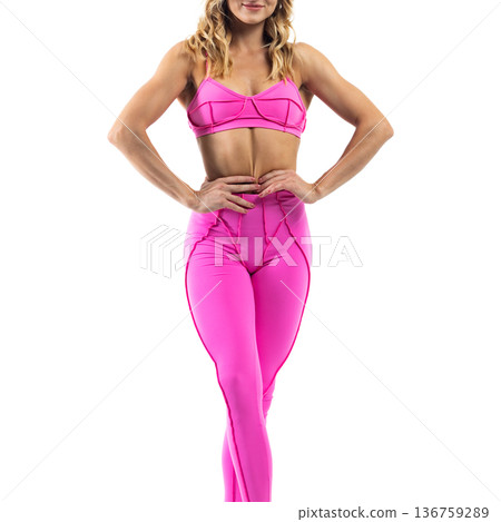 Athletic woman posing in pink sports bra and leggings with transparent background Athletic woman posing in pink sports bra and leggings with transparent background 136759289