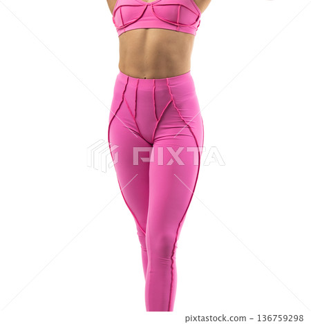Athletic woman posing in pink sports bra and leggings with transparent background Athletic woman posing in pink sports bra and leggings with transparent background 136759298