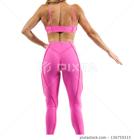 Athletic woman posing in pink sports bra and leggings with transparent background Athletic woman posing in pink sports bra and leggings with transparent background 136759315