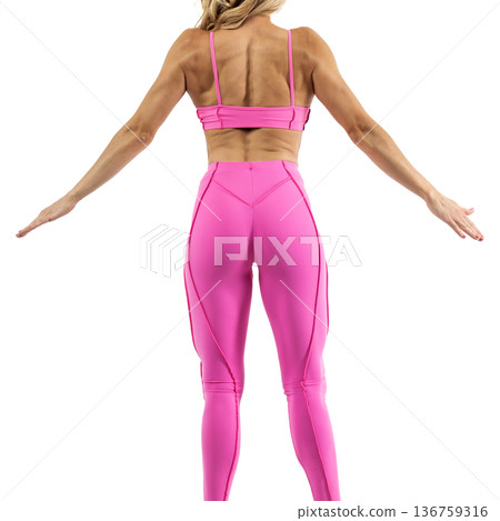 Athletic woman posing in pink sports bra and leggings with transparent background Athletic woman posing in pink sports bra and leggings with transparent background 136759316