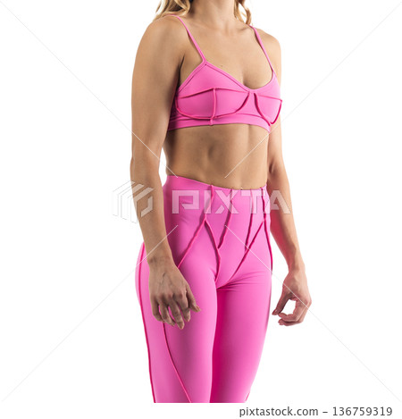 Athletic woman posing in pink sports bra and leggings with transparent background Athletic woman posing in pink sports bra and leggings with transparent background 136759319