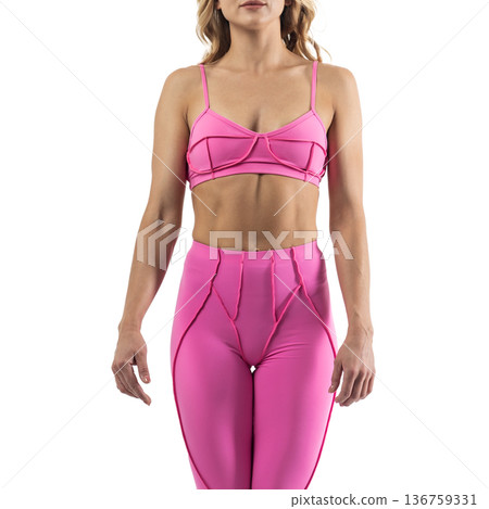 Athletic woman posing in pink sports bra and leggings with transparent background 136759331