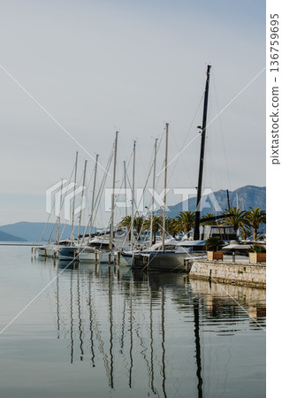 Amazing view of yacht marina Porto Montenegro in Tivat, Montenegro. Beautiful sunny day. Amazing view of yacht marina Porto Montenegro in Tivat, Montenegro. Beautiful sunny day. 136759695