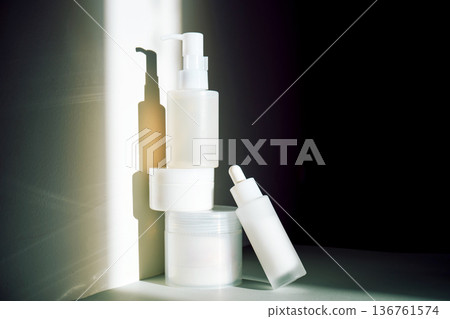 Skincare cosmetic products minimalist composition with natural light Skincare cosmetic products minimalist composition with natural light 136761574