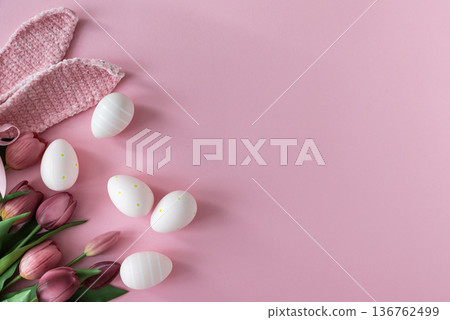 Easter Eggs with Bunny Ears and Tulips on Pink Background. Spring Holiday Flat Lay 136762499