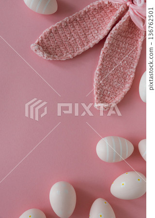Easter Eggs with Bunny Ears on Pink Background. Spring Holiday Composition Easter Eggs with Bunny Ears on Pink Background. Spring Holiday Composition 136762501