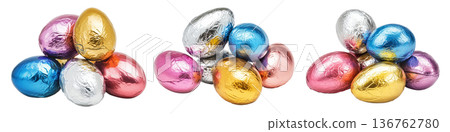 Set of Chocolate Easter eggs wrapped in metallic foil of gold, silver, pink, and blue isolated on white transparent background Set of Chocolate Easter eggs wrapped in metallic foil of gold, silver, pink, and blue isolated on white transparent background 136762780