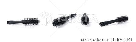 Black round hair styling brush isolated 136763141
