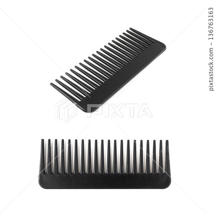 Black plastic comb isolated Black plastic comb isolated 136763163