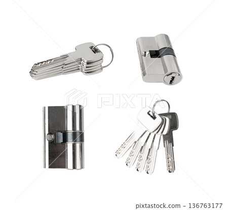 Keys and lock cylinder for door lock isolated. Pin tumbler components ready to replace or repair Keys and lock cylinder for door lock isolated. Pin tumbler components ready to replace or repair 136763177