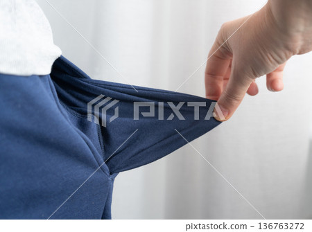 Empty pockets close-up. Person is showing financial loss, no money, poor person 136763272