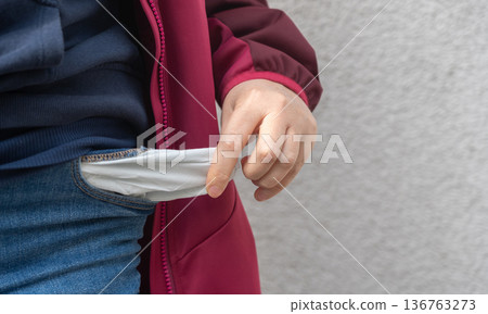 Empty pockets close-up. Woman is showing financial loss, no money, poor person 136763273