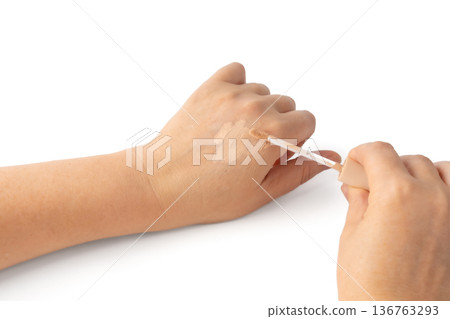 Foundation cream smear isolated. Cosmetic concealer textured swatch, skin tone cream 136763293