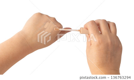 Foundation cream smear isolated. Cosmetic concealer textured swatch, skin tone cream Foundation cream smear isolated. Cosmetic concealer textured swatch, skin tone cream 136763294