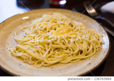 traditional italian pasta carbonara on a plate traditional italian pasta carbonara on a plate 136763668