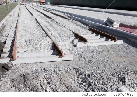 Railway tracks on the construction site Railway tracks on the construction site 136764683