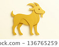 Paper goat created from layered golden shapes with clean minimalist lines and smooth paper texture. Modern decorative design on a light background. 136765259