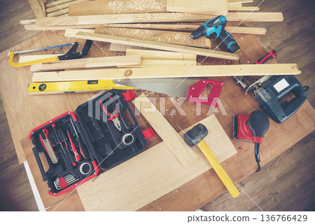 DIY craftsperson wood heap carpenter objects woodwork handyman desk. Architect tools with ruler measure hammer home improvement equipments. Wooden builder carpenter repairing construction workshop DIY craftsperson wood heap carpenter objects woodwork handyman desk. Architect tools with ruler measure hammer home improvement equipments. Wooden builder carpenter repairing construction workshop 136766429