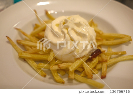 Golden French Fries Served Hot on Plate Golden French Fries Served Hot on Plate 136766716